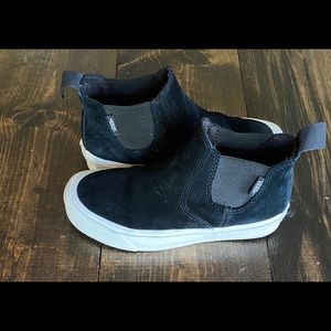 Black suede high top vans